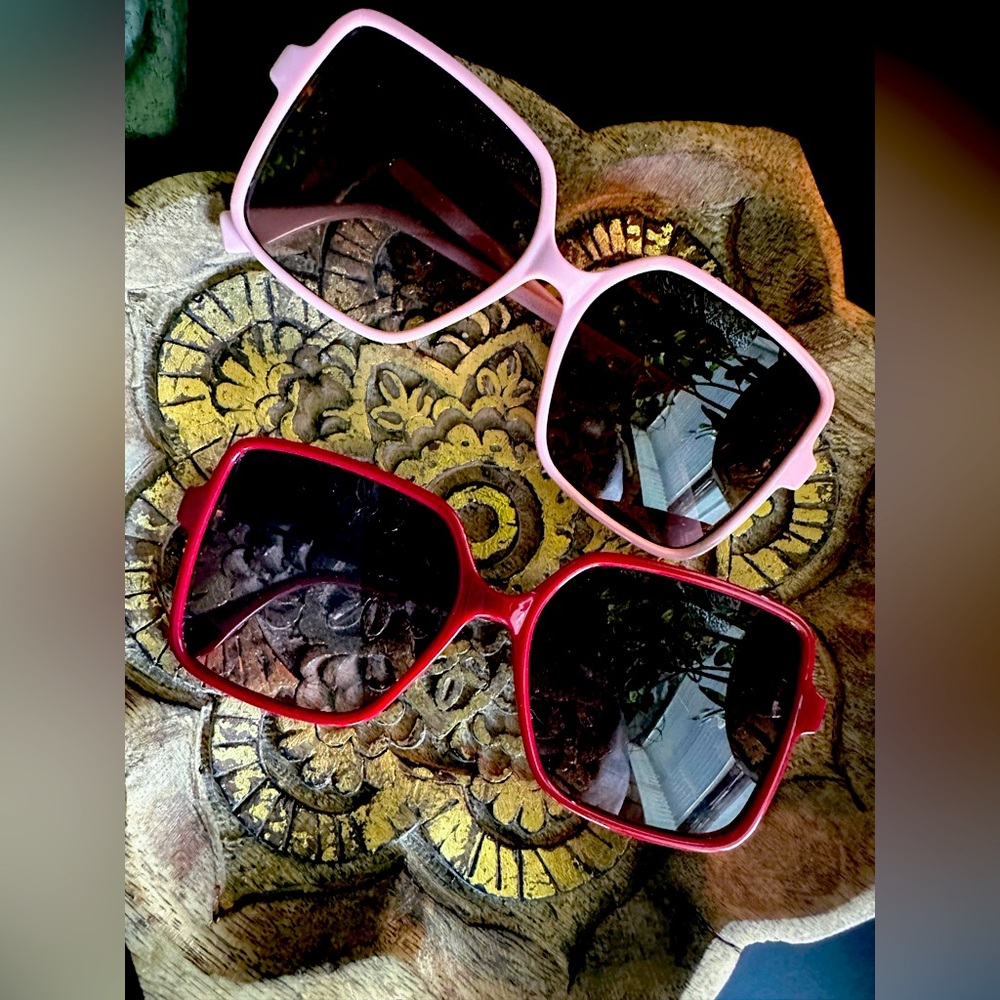 2 pair of brand new, never worn, super cute sunglasses! (cases included)